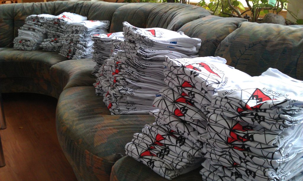 A big pile of MEMO T-shirts